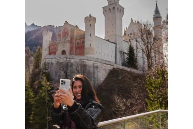 a man standing in front of a building